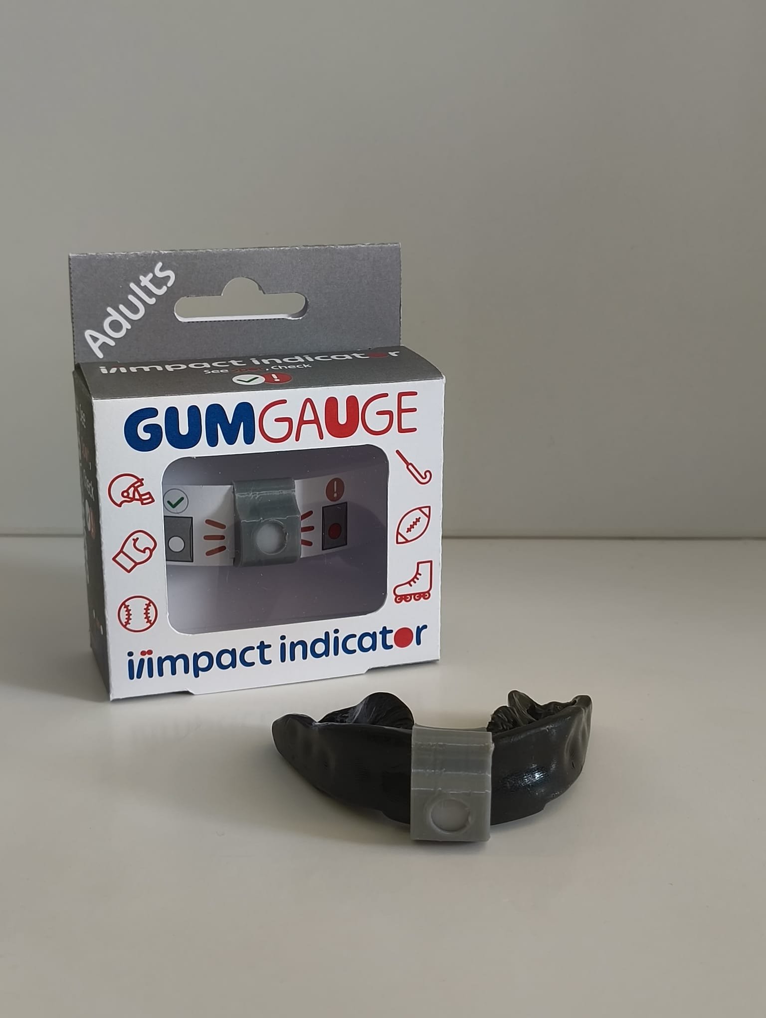 GumGauge Adults — grey packaging with dark mouthguard and impact indicator